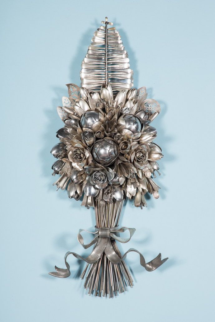 Flowers from forks and spoons. Fantastic compositions from cutlery