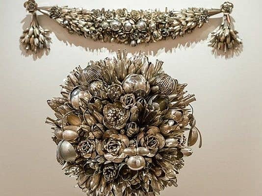 Flowers from forks and spoons. Fantastic compositions from cutlery