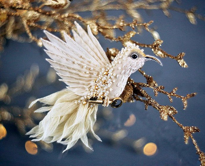 Flying fantasy. Magic birds from silk, beads, sequins and